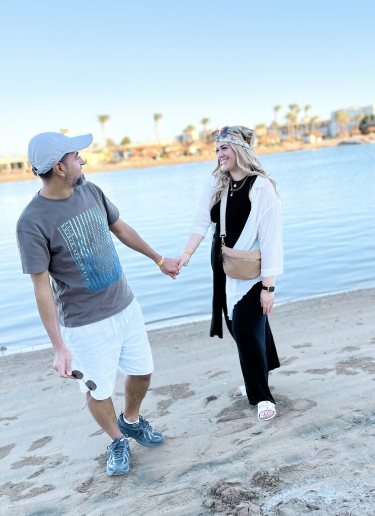 Couple holding hands on the beach El Gouna Egypt