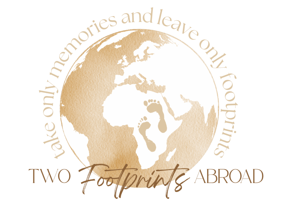 Logo Two Footprints Abroad - take only memories and leave only footprints, worldmap with footprints