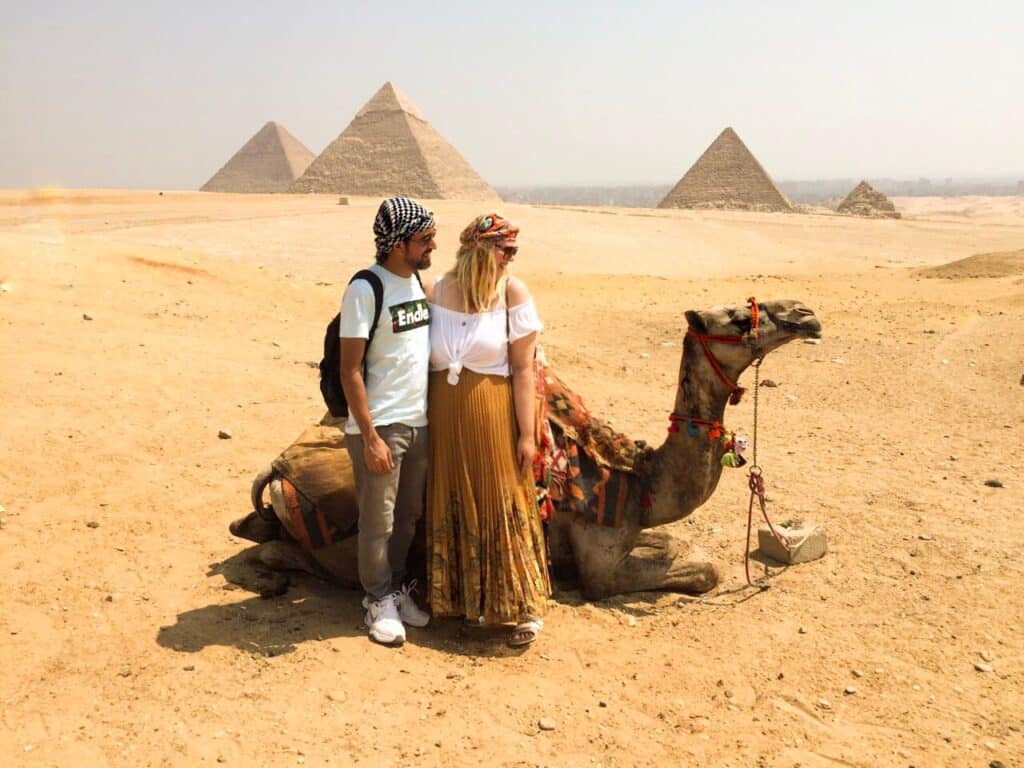 couple at the Pyramids Gizeh Egypt with camel